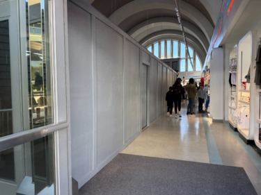 Construction Walls Installed in Tomorrowland Launch Depot at Magic Kingdom