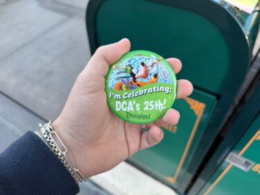 Cast Members Handing Out Commemorative Buttons for California Adventure’s 25th Birthday