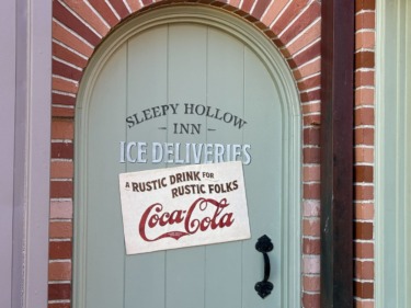 Themed Coca-Cola Signs Added to Sleepy Hollow Refreshments in Magic Kingdom