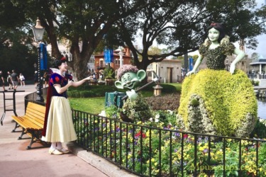 Snow White Admires Snow White & Seven Dwarfs Topiaries Ahead of Epcot Flower & Garden (Photos, Video)