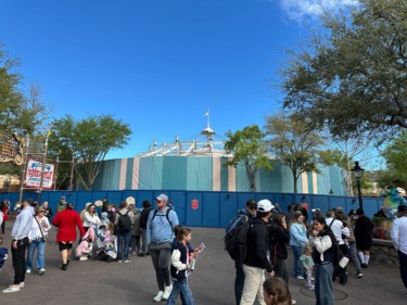 Big Top Souvenirs Topless & Surrounded by Striped Scrim in Magic Kingdom