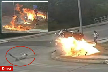 Motorcycle skids off the road and explodes — narrowly missing school kids — in insane video