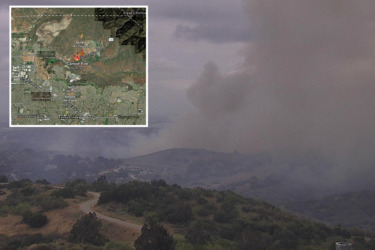 Wind fuels brush fire in OC, closing roads and forcing evacuation warnings