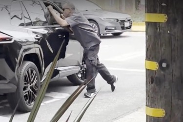 Angry man seen dangling off the side of car in San Francisco road rage incident: ‘He’s running him over’