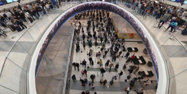 Passenger allegedly boards flight with fake boarding pass, forcing plane back to gate