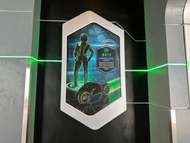 Team Green Posters Have New Characters in TRON Lightcycle Run Post-Show
