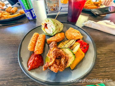 REVIEW: This Elevated Disney Springs Hotel Pool Bar Puts Others To Shame