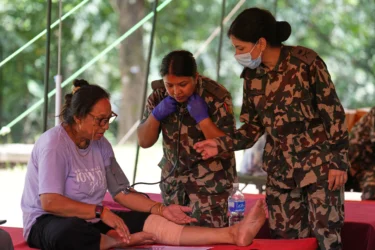 Death toll rises in Nepal-China border disaster as a lake poses new flood threat