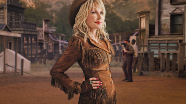 Remembering Dolly Parton: Singer, Actress, Cultural Icon + Where to Watch Her Films, Specials & More
