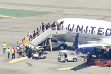 Packed United flight blows tire on runway at major California airport