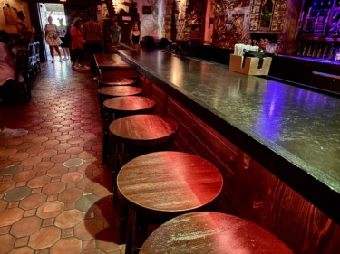 Barstools Added to The Beak & Barrel in Magic Kingdom, Guests No Longer Forced to Stand