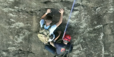 Free climber stranded on Georgia rock face calls 911, prompting dramatic rescue by firefighter