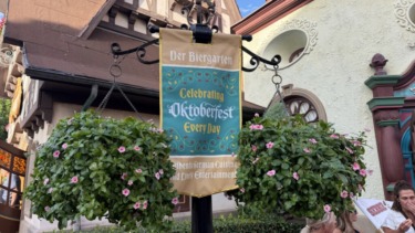 New oktoberfest themed banners installed at biergarten restaurant in epcot 2