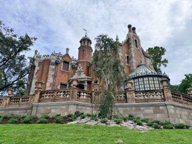 Welcome to the haunted mansion exterior refurbishment completed on beloved magic kingdom attraction 6
