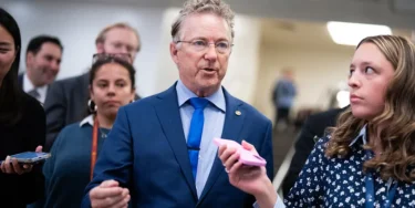 Rand paul speaks to reporters in senate basement