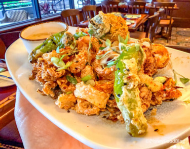 2026 wdw saratoga springs turf club bar and grill golden shishito peppers and calamari 3