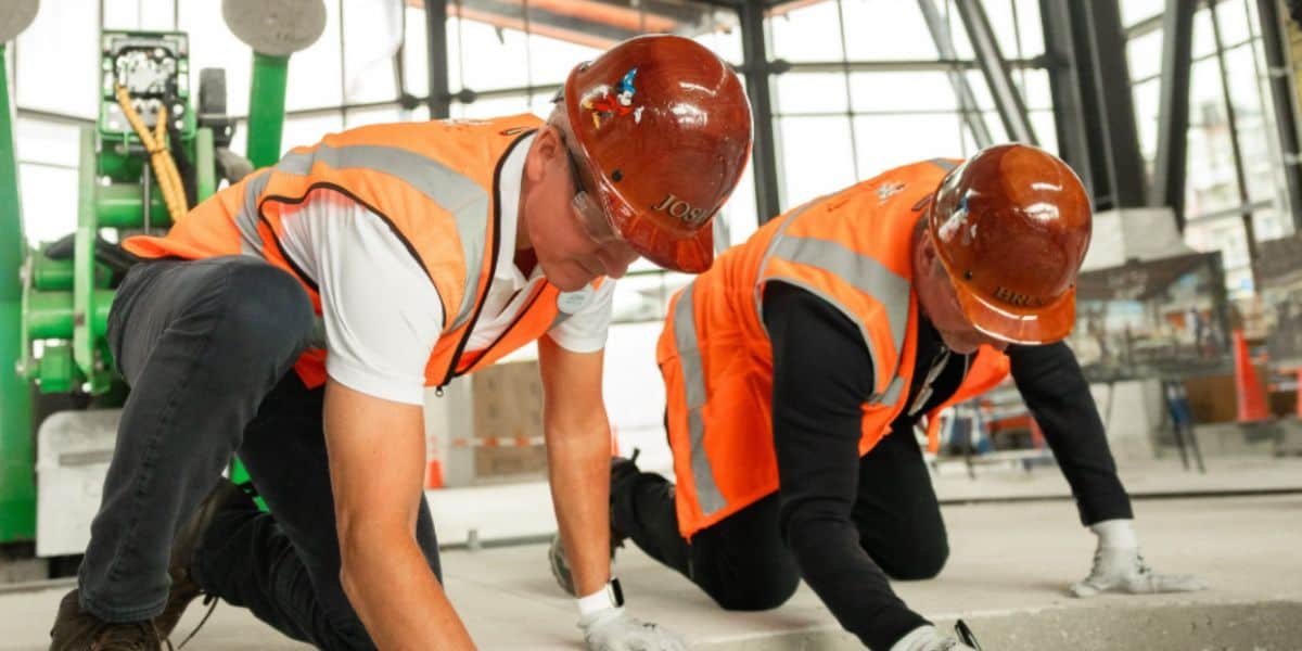 Two walt disney imagineers work on disney world projects